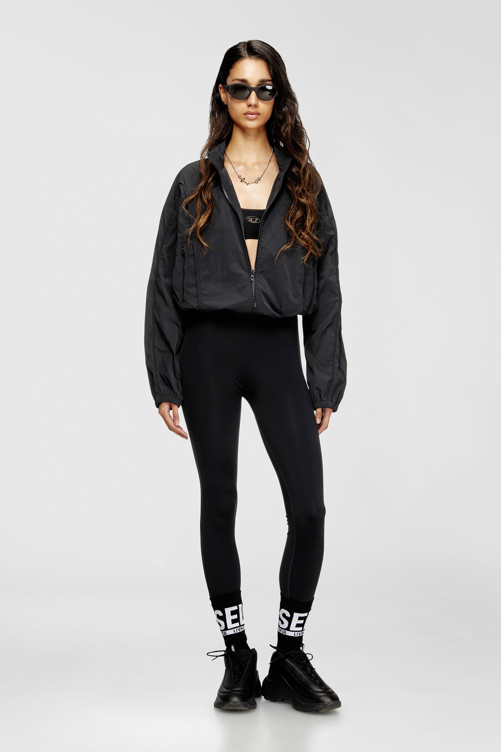 Diesel - MEREDITH-UTLT, Leggings de nailon con abertura en la parte trasera Oval D Mujer in Negro - 6