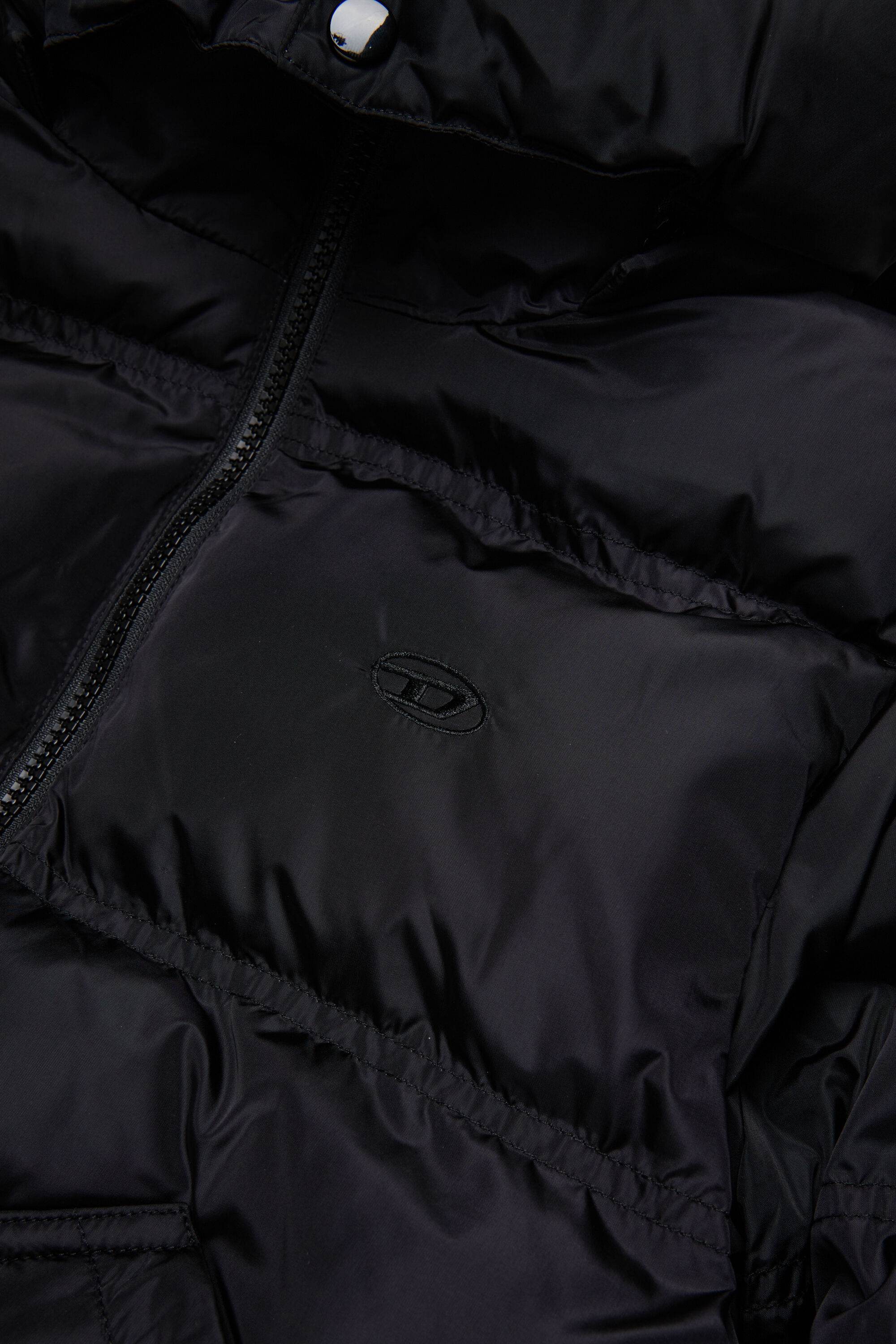 Diesel - JRIVON, Chaqueta acolchada con capucha y bolsillos oversize Unisex in Negro - 4