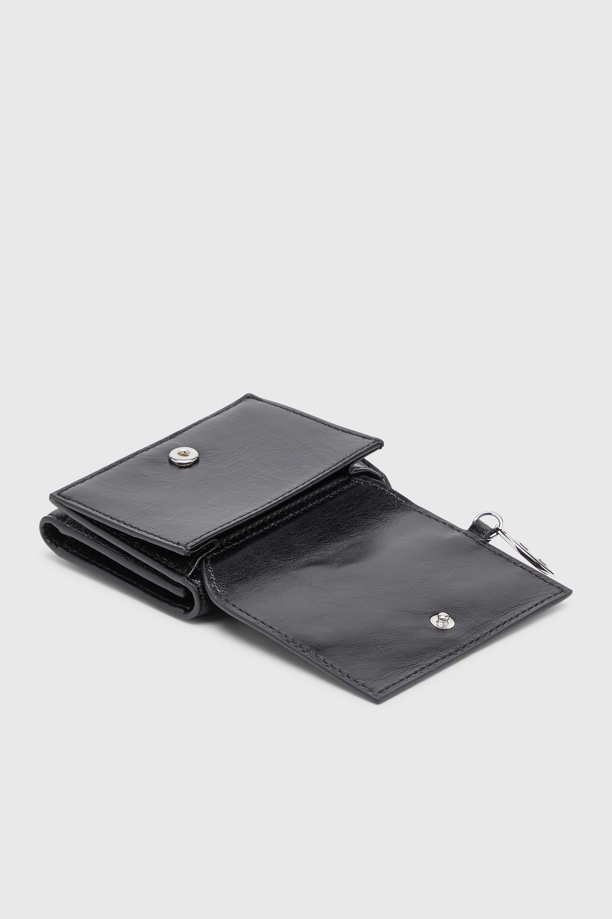 Diesel - OVAL-D TRI FOLD ZIP COIN XS II, Cartera de piel triple con motivo en relieve Mujer in Negro - 4