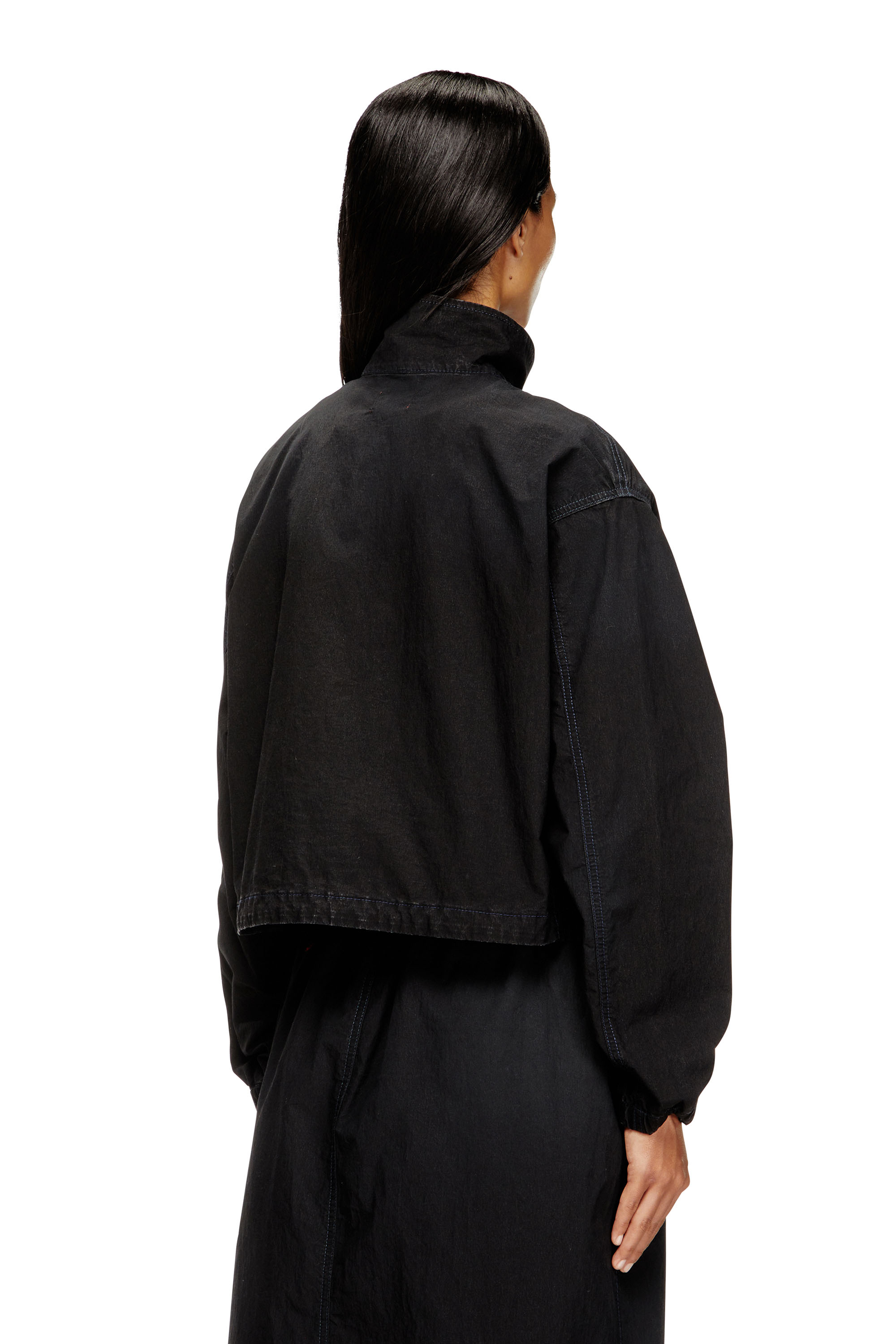 Diesel - DE-SANDERZ JOGG, Chaqueta de tejido técnico JoggJeans con cuello alto Mujer in Negro - 4