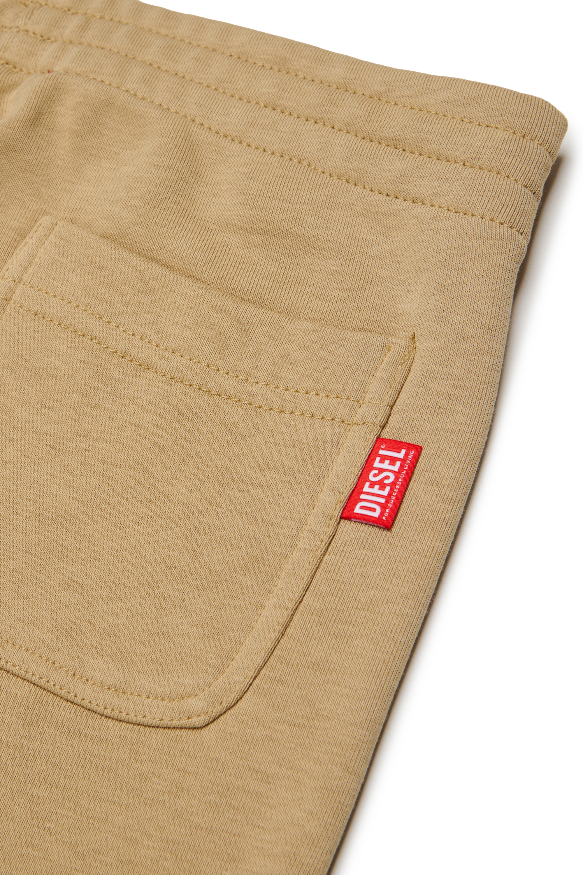 Diesel - PRES, Pantal&oacute;n de ch&aacute;ndal con logo cortado Hombre in Marr&oacute;n - 4
