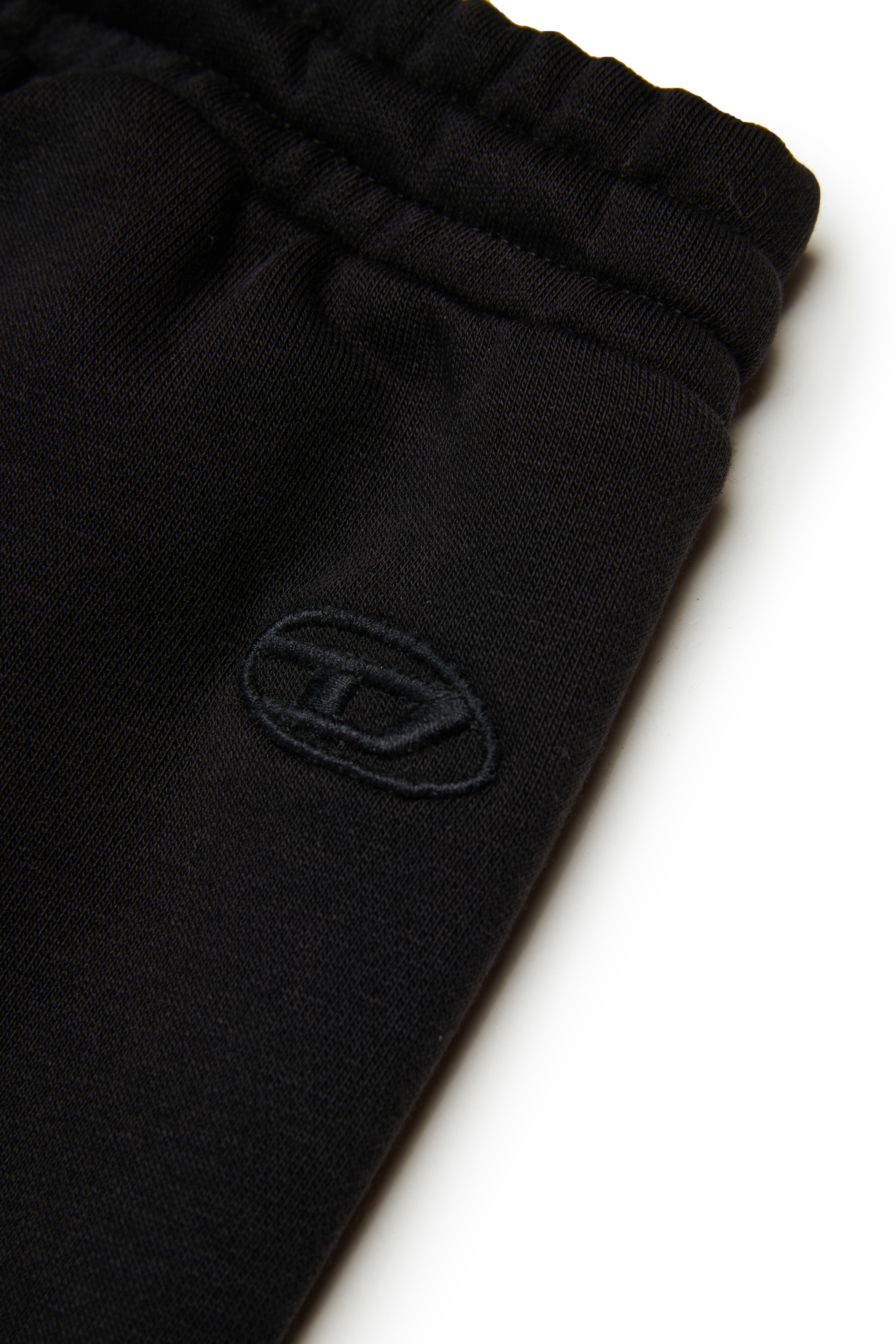 Diesel - PLUTUS, Pantalones de chándal con bolsillos cargo Hombre in Negro - 4