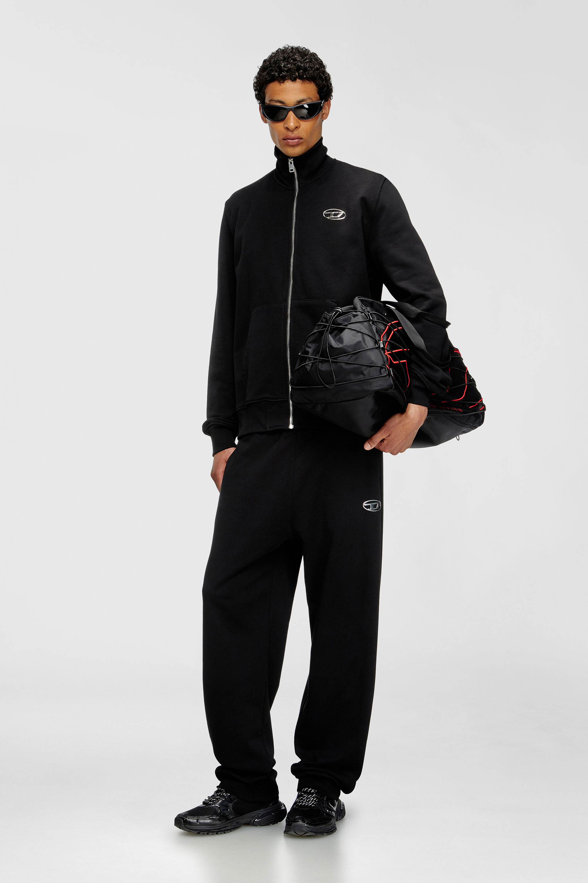 Diesel - P-MARKY-OD, Pantalones con logotipo Oval D con efecto met&aacute;lico Hombre in Negro - 1