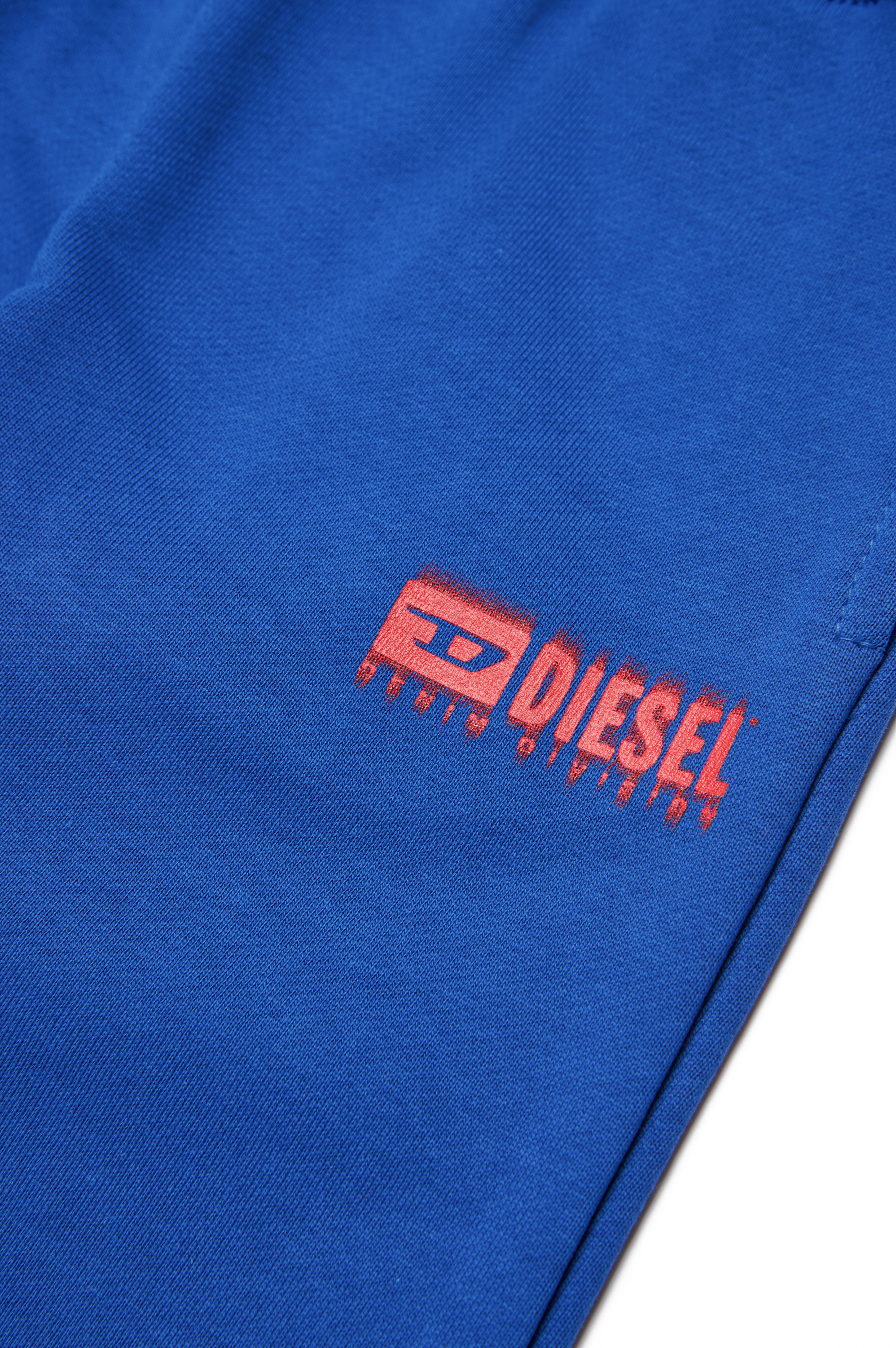 Diesel - PBASEB, Unisex Pantalones deportivos con logotipo manchado in Azul marino - Image 4
