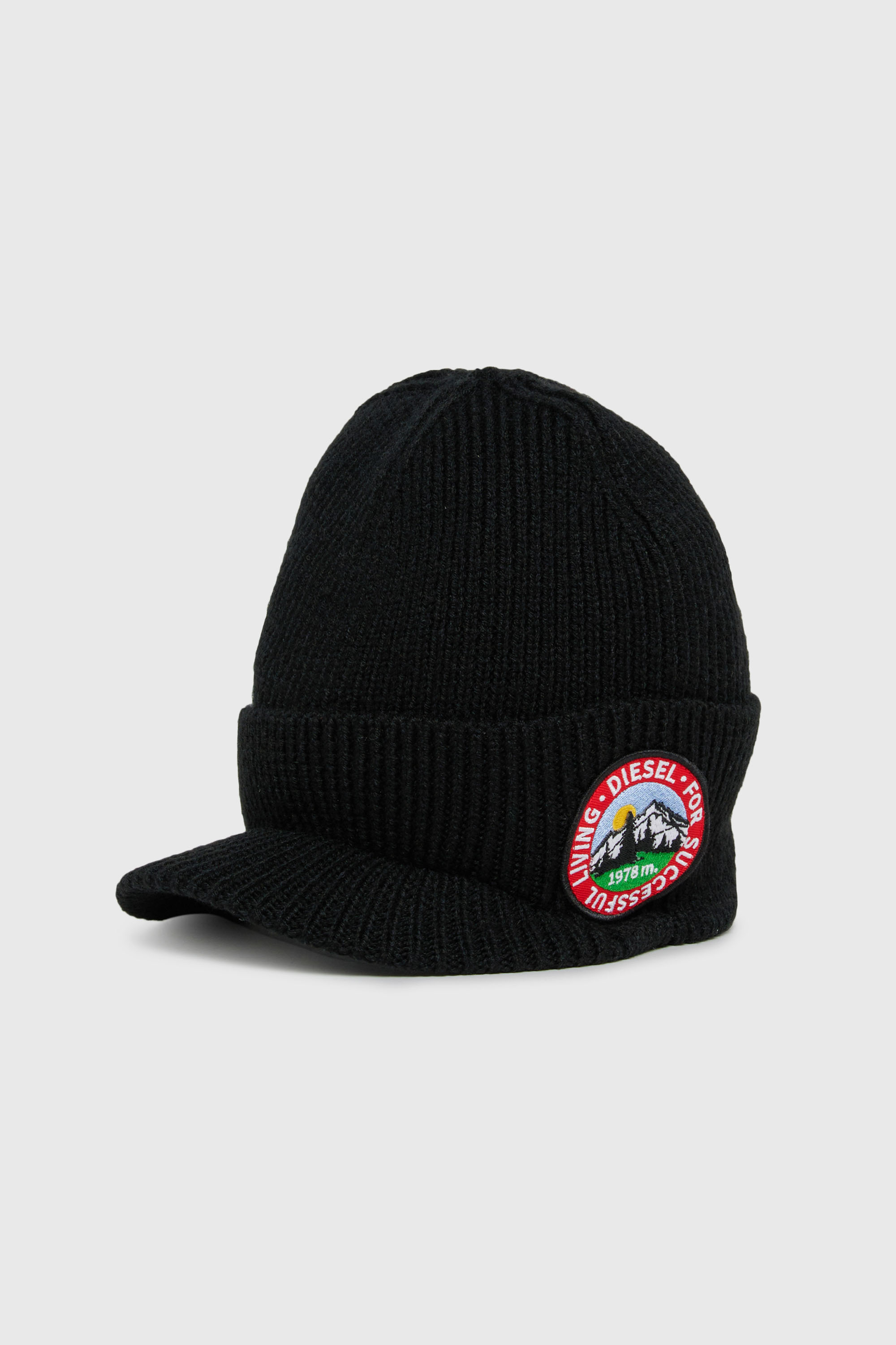 Diesel - FMONTI, Gorro con visera de punto de lana acanalada Unisex in Negro - 1