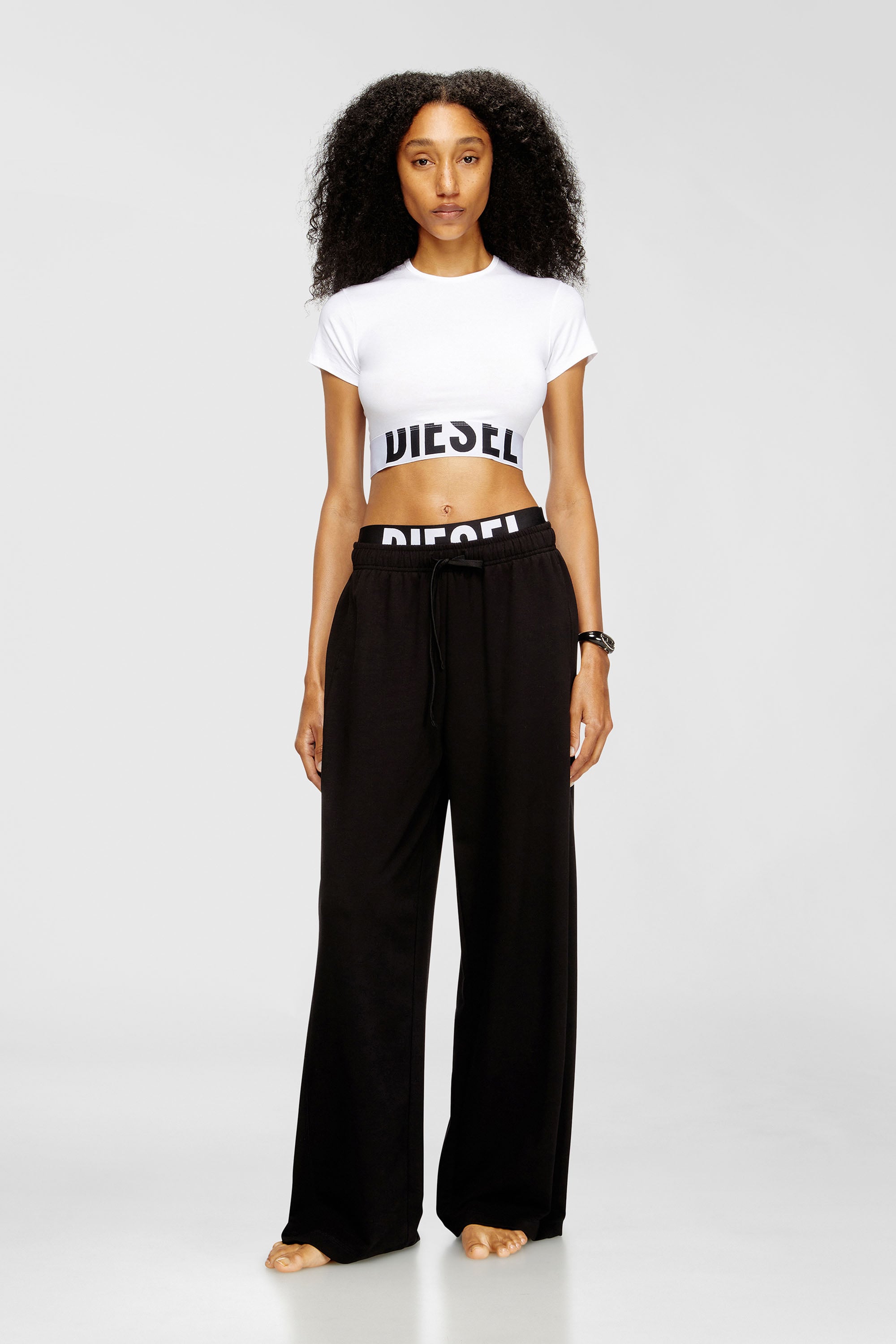 Diesel - LESLIE-D-POP, Pantalones de ch&aacute;ndal de felpa de algod&oacute;n con cinturilla con logo Mujer in Negro - 1