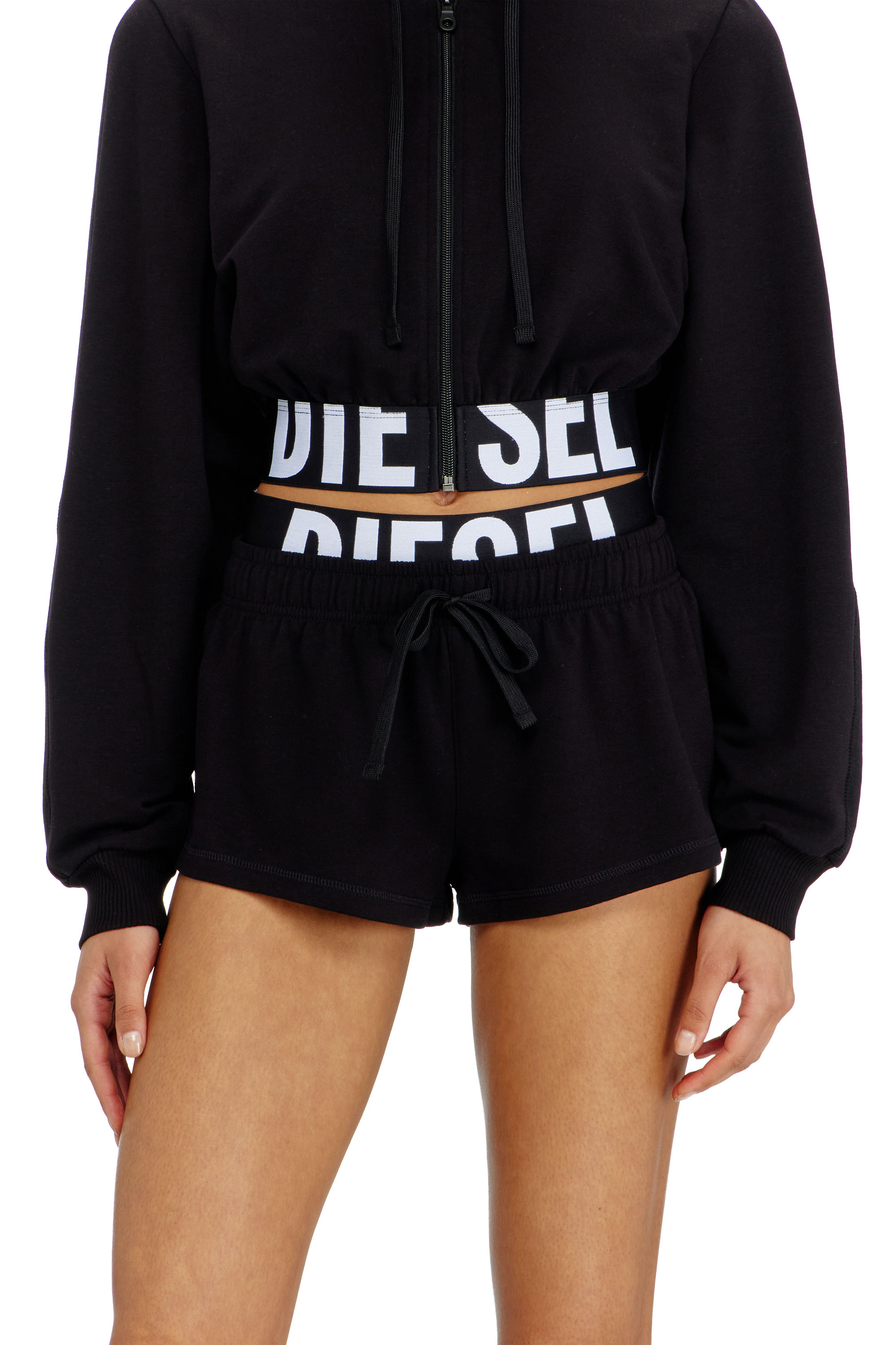 Diesel - MIRANDA-D-POP, Pantalones cortos de felpa de algod&oacute;n con logo de Diesel Mujer in Negro - 2