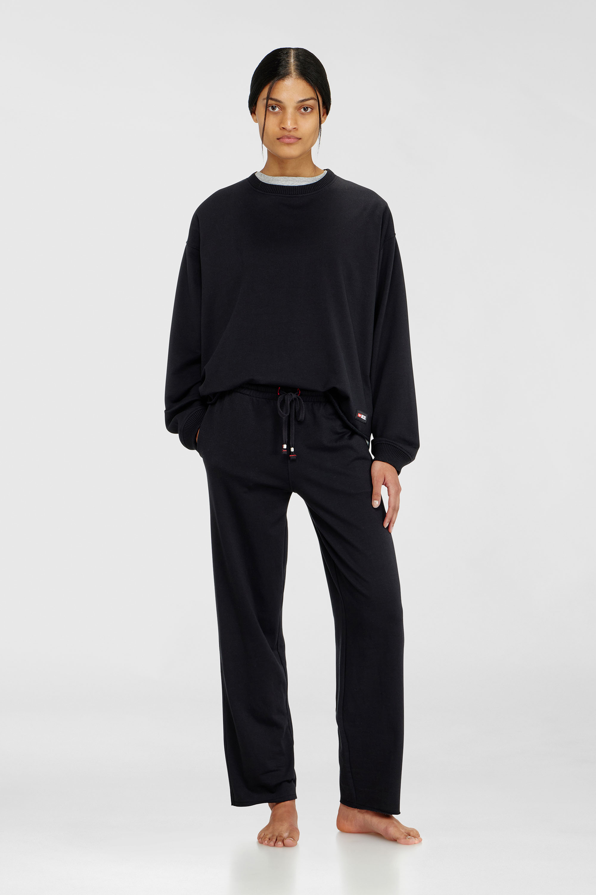 Diesel - INDRA-D-CORE, Woman's Peached sweatpants with raw hems in Black - 2